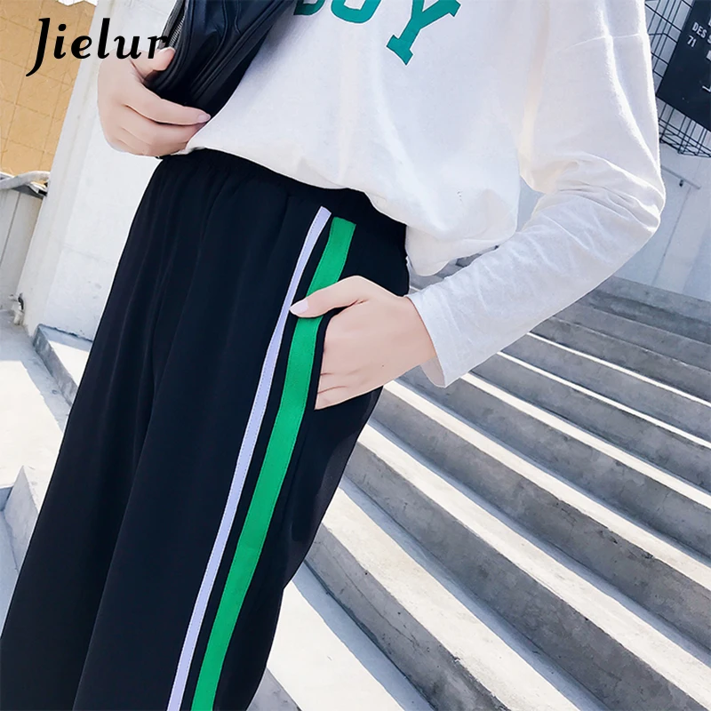 red and green striped pants