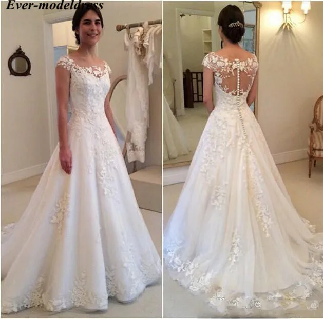 Vintage Wedding Dresses 2020 Cap Sleeves O-Neck Button Back Sweep Train Lace Appliques Bridal Gowns Plus Size Vestido De Noiva
Vintage Wedding Dresses 2020 Cap Sleeves O-Neck Button Back Sweep Train Lace Appliques Bridal Gowns Plus Size Vestido De Noiva