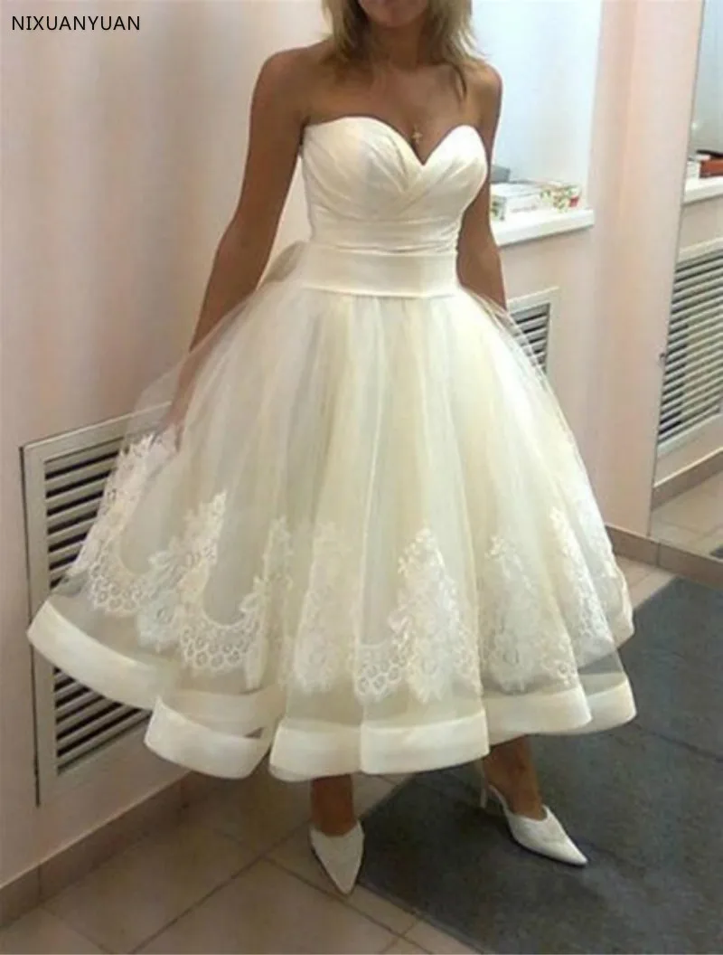 Vestido De Noiva 2019 White Sweetheart Neck Sleeveless A-Line Short Wedding Dress Backless Tea-length Bridal Gown Robe De Mariee
Vestido De Noiva 2019 White Sweetheart Neck Sleeveless A-Line Short Wedding Dress Backless Tea-length Bridal Gown Robe De Mariee