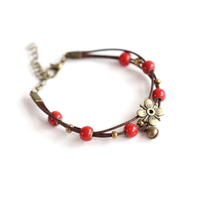 Miage Vintage Handmade China Ceramic Color Beads Bronze Flower Bells Pendant Rope Bracelet Women Fashion Ethnic Jewelry
Miage Vintage Handmade China Ceramic Color Beads Bronze Flower Bells Pendant Rope Bracelet Women Fashion Ethnic Jewelry
