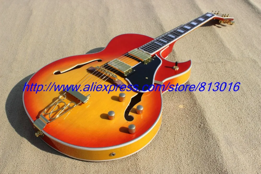 Hot ! customised electric guitar jazz hollow body cherry burst,build in customer specs way, gold parts, floating bridge!
Hot ! customised electric guitar jazz hollow body cherry burst,build in customer specs way, gold parts, floating bridge!
