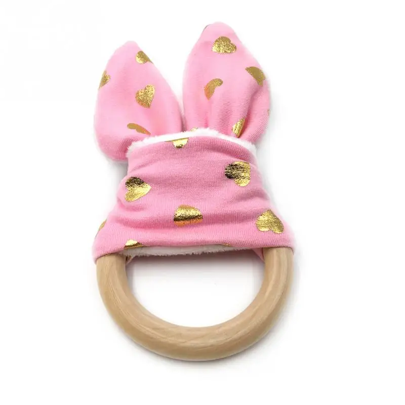 Natural Wooden Baby Teether Rabbit Ear Sensory Toy Baby Professional Teething Ring Wooden Baby Safety Teether
Natural Wooden Baby Teether Rabbit Ear Sensory Toy Baby Professional Teething Ring Wooden Baby Safety Teether