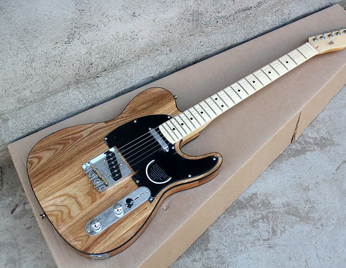 Natural Wood Color Electric Guitar with ASH Body,Black Pickguard and Binding,Chrome Hardwares,offer customized as you request
Natural Wood Color Electric Guitar with ASH Body,Black Pickguard and Binding,Chrome Hardwares,offer customized as you request
