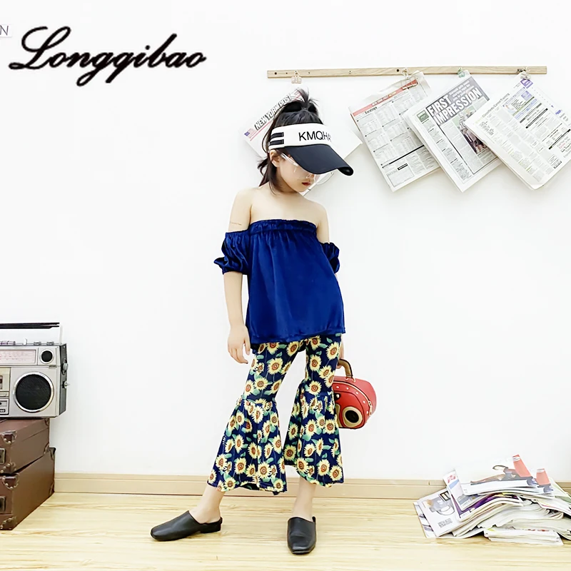 Baby girl suit 2019 summer new word shoulder tube top gold velvet shirt micro-la thin slim pants two sets of children's clothes
Baby girl suit 2019 summer new word shoulder tube top gold velvet shirt micro-la thin slim pants two sets of children's clothes