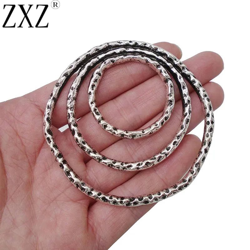 ZXZ 2pcs Antique Silver Large Hammered Metal 3 Rings Circles Boho Charms Pendants for Jewelry Making Findings 70mm
ZXZ 2pcs Antique Silver Large Hammered Metal 3 Rings Circles Boho Charms Pendants for Jewelry Making Findings 70mm