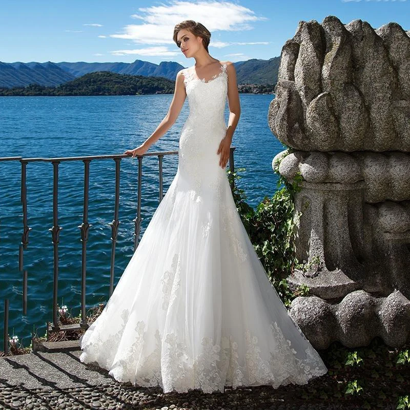 New Beach Mermaid Wedding Dresses White Lace Appliques Sheer Neck Illusion Back Bridal Gown Long Court Train Robe De Marriage
New Beach Mermaid Wedding Dresses White Lace Appliques Sheer Neck Illusion Back Bridal Gown Long Court Train Robe De Marriage