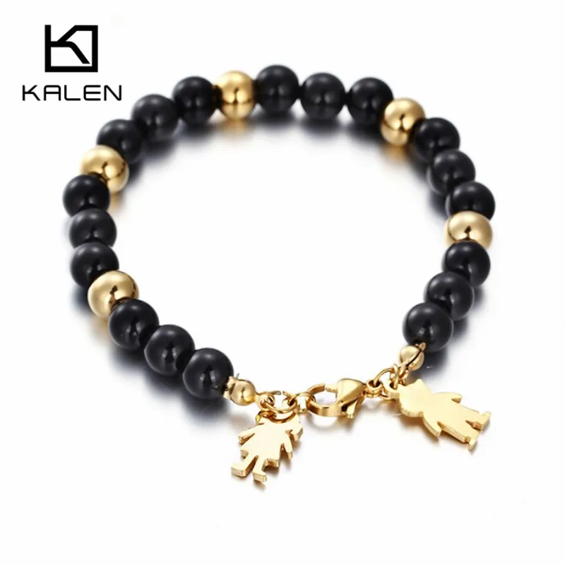 Kalen Ethnic Stainless Steel Cartoon Boy & Girl Charm Bracelets Gold & Black Color Plastic Beads Elastic Bracelets Drop Shipping
Kalen Ethnic Stainless Steel Cartoon Boy & Girl Charm Bracelets Gold & Black Color Plastic Beads Elastic Bracelets Drop Shipping
