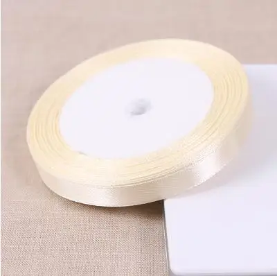 High Quality A Roll 1CM Width 25 Yards Length Ivory Ribbon Wedding Home Decor Polyester Ribbons Box Warp HandMade Craft Fabric
High Quality A Roll 1CM Width 25 Yards Length Ivory Ribbon Wedding Home Decor Polyester Ribbons Box Warp HandMade Craft Fabric