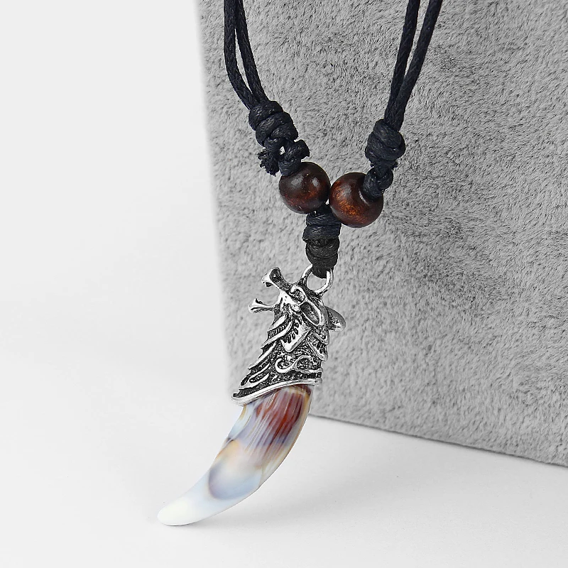 1pcs Fashion Necklace Metal Wolf Heads Resin Tooth Pendant Punk Style Necklace Black Wax Cord Necklace Collar Jewelry Adjustable
1pcs Fashion Necklace Metal Wolf Heads Resin Tooth Pendant Punk Style Necklace Black Wax Cord Necklace Collar Jewelry Adjustable