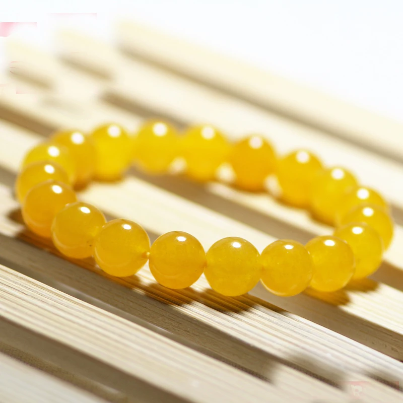 Желтые гладкие круглые браслеты из бусин натурального камня эластичные