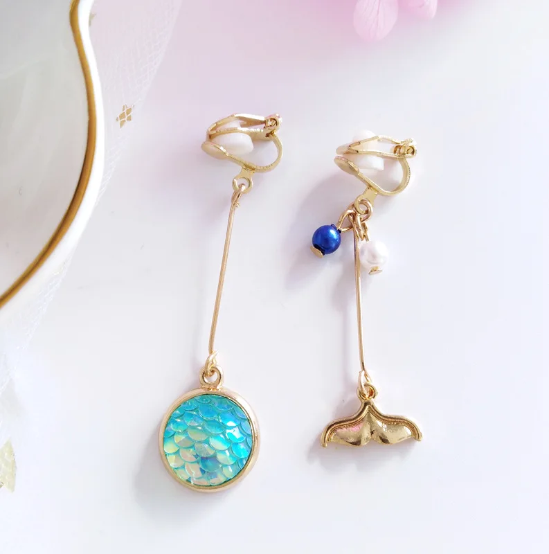 Simple Metal Mermaid Fish Tail Clip Earrings Without Piercing Hole Fish Scale Shape Line Tassel Long Thread Ear Clip on Earrings
Simple Metal Mermaid Fish Tail Clip Earrings Without Piercing Hole Fish Scale Shape Line Tassel Long Thread Ear Clip on Earrings