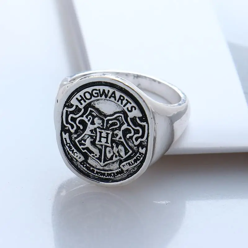 New Hogwarts Bade Seal Death Hallows Ring the Slytherin School Steampunk Women and Men High Quality Cocktail Ring Drop Shipping
New Hogwarts Bade Seal Death Hallows Ring the Slytherin School Steampunk Women and Men High Quality Cocktail Ring Drop Shipping