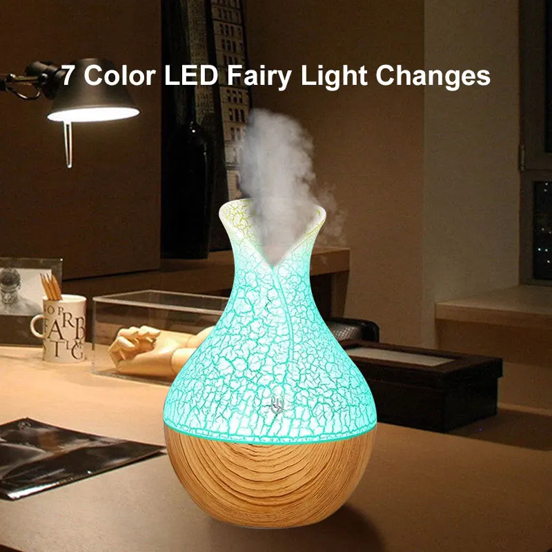 Aroma Diffuser USB Cool Mist Humidifier Essential Oil Air Purifier For Office Home With 7 Color Change LED Night light
Aroma Diffuser USB Cool Mist Humidifier Essential Oil Air Purifier For Office Home With 7 Color Change LED Night light