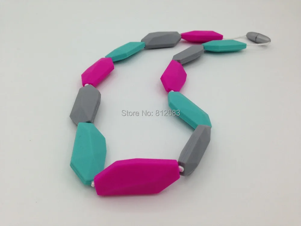 2015 hot Silicone Teething Necklace Nursing Necklace with Pendants Geometric Stones -jack Necklace-bead Free Shipping
2015 hot Silicone Teething Necklace Nursing Necklace with Pendants Geometric Stones -jack Necklace-bead Free Shipping
