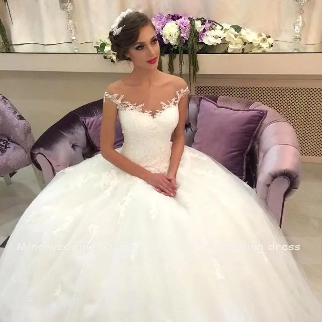 Cap Sleeves Wedding Dresses 2019 Princess Lace Appliqued Ball Gown Bridal Gown Back Lace Up with Sweep Train Vestido de Noiva
Cap Sleeves Wedding Dresses 2019 Princess Lace Appliqued Ball Gown Bridal Gown Back Lace Up with Sweep Train Vestido de Noiva