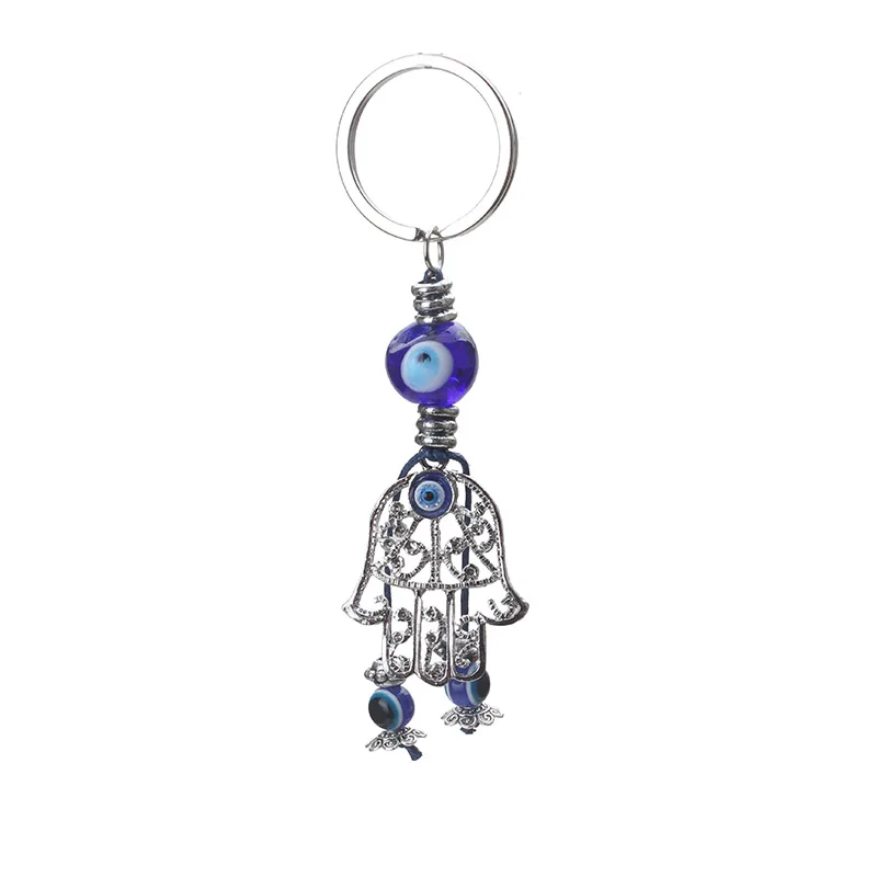 EVIL EYE new fashion blue evil eye Hamsa hand keychain trendy material material Hamsa keychain for woman man eye keychain
EVIL EYE new fashion blue evil eye Hamsa hand keychain trendy material material Hamsa keychain for woman man eye keychain
