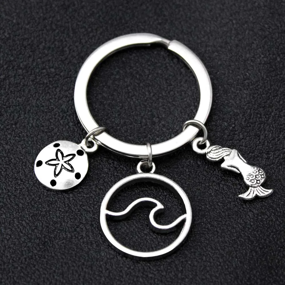 Ocean Waves Mermaid Sand Dollar Keychain Seahorse Starfish Shell Sea Turtle Keychains Key Chain KeyRing Best Friend Love Jewelry
Ocean Waves Mermaid Sand Dollar Keychain Seahorse Starfish Shell Sea Turtle Keychains Key Chain KeyRing Best Friend Love Jewelry