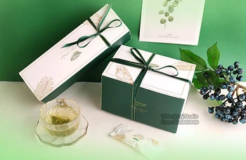 Cute Green Leaves Gift box Creative Tote Bag Nougat Cookies Box Wedding Party Bag Chocolate Cake Bread Boxs Candy Packaging Box
Cute Green Leaves Gift box Creative Tote Bag Nougat Cookies Box Wedding Party Bag Chocolate Cake Bread Boxs Candy Packaging Box
