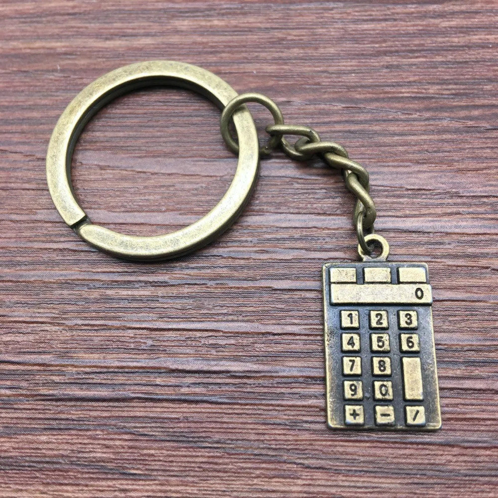 Keyring Calculators Keychain 23x13mm Antique Bronze New Fashion Handmade Metal KeyChain Souvenir Gifts For Women A12740
Keyring Calculators Keychain 23x13mm Antique Bronze New Fashion Handmade Metal KeyChain Souvenir Gifts For Women A12740