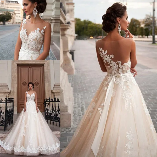 Champagne Wedding Dresses 2019 Princess A-Line Beads Appliques Sashes Designer Bridal Gown Vestido de Novia gelinlic robe mariee
Champagne Wedding Dresses 2019 Princess A-Line Beads Appliques Sashes Designer Bridal Gown Vestido de Novia gelinlic robe mariee