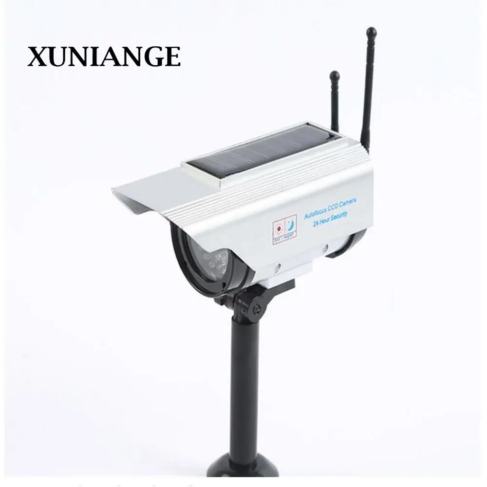 

XUNIANGE Simulation Camera Solar Energy Realistic Dummy Camera Sticker Cam Blinking Red LED Light with Fake Video Cable Surveil