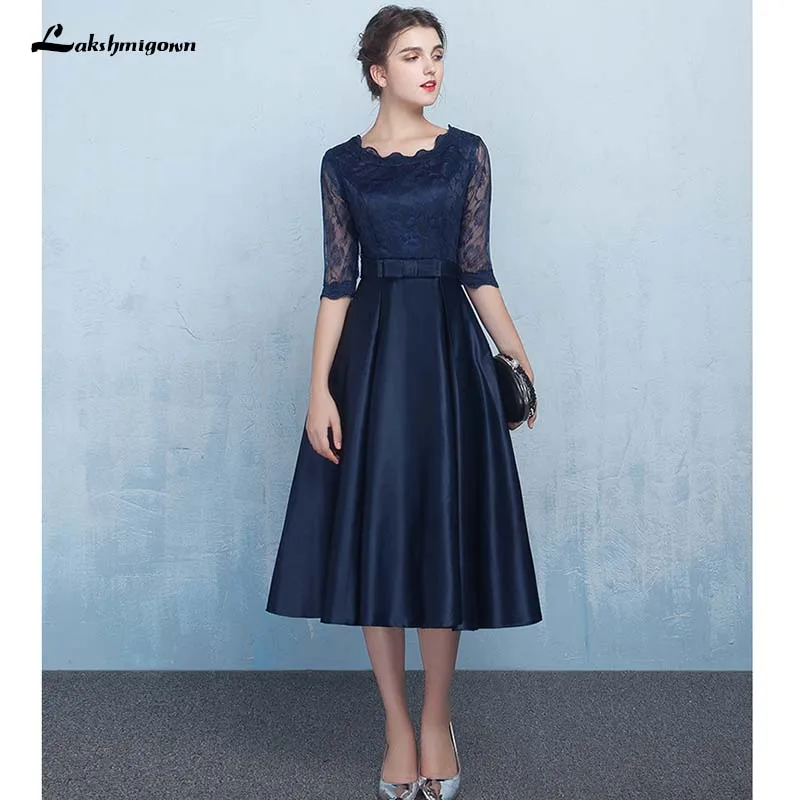 Elegant Navy Blue Lace Mother of the Bride Dresses Champagne Formal Women Evening Dress Zipper Back Knee Length Real Photos
Elegant Navy Blue Lace Mother of the Bride Dresses Champagne Formal Women Evening Dress Zipper Back Knee Length Real Photos