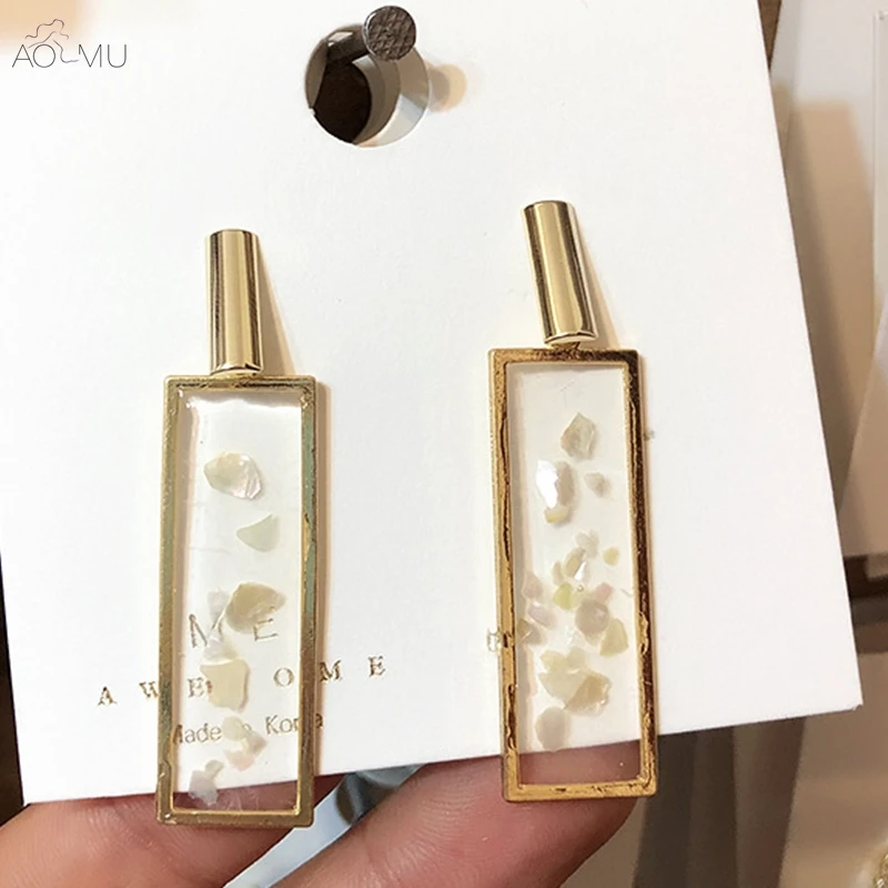 AOMU S925 Sterling Silver Pin Acrylic Transparent Pearl Shell Irregular Oval Hollow Drop Earrings for Women Girl Jewelry Gift
AOMU S925 Sterling Silver Pin Acrylic Transparent Pearl Shell Irregular Oval Hollow Drop Earrings for Women Girl Jewelry Gift