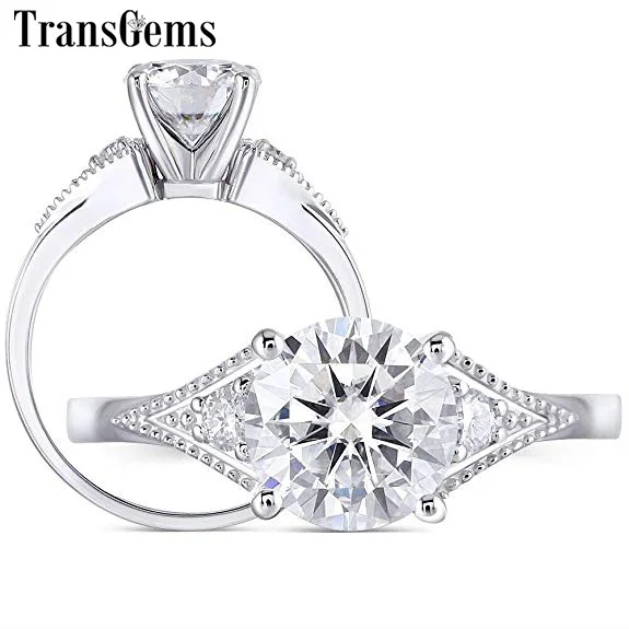 Transgems 14k 585 White Gold 1.5ct 7.5mm F Color Moissanite 2*2.5mm Side Moissanite Engagement Ring for Women Wedding Gifts
Transgems 14k 585 White Gold 1.5ct 7.5mm F Color Moissanite 2*2.5mm Side Moissanite Engagement Ring for Women Wedding Gifts