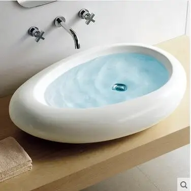 Ceramic basin of large size on white lavabo art basin lavatory basin oval hotel
Ceramic basin of large size on white lavabo art basin lavatory basin oval hotel