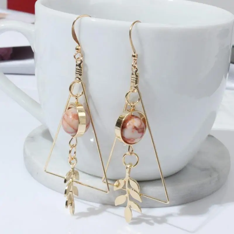 Beautiful retro triangle design sense of leaf hollow marble beads earrings Earrings For Women Earings Fashion Jewelry 2017
Beautiful retro triangle design sense of leaf hollow marble beads earrings Earrings For Women Earings Fashion Jewelry 2017