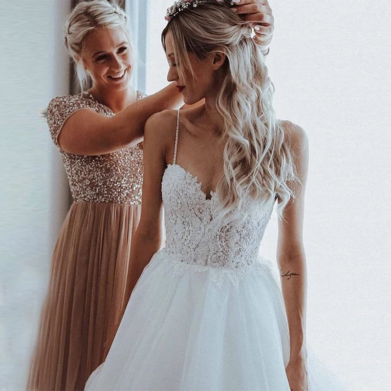 Boho A-line Wedding Dress Spaghetti Straps Appliques Beading Open Back Bridal Dress Chapel Train Elegant Backless Robe De Mariee
Boho A-line Wedding Dress Spaghetti Straps Appliques Beading Open Back Bridal Dress Chapel Train Elegant Backless Robe De Mariee