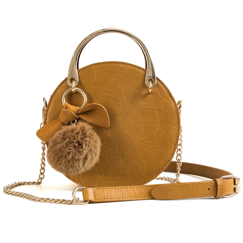 Burst pattern sweet lady wool ball pendant small round bag. bow bow single shoulder oblique span. lady handbag. woman bag.
Burst pattern sweet lady wool ball pendant small round bag. bow bow single shoulder oblique span. lady handbag. woman bag.