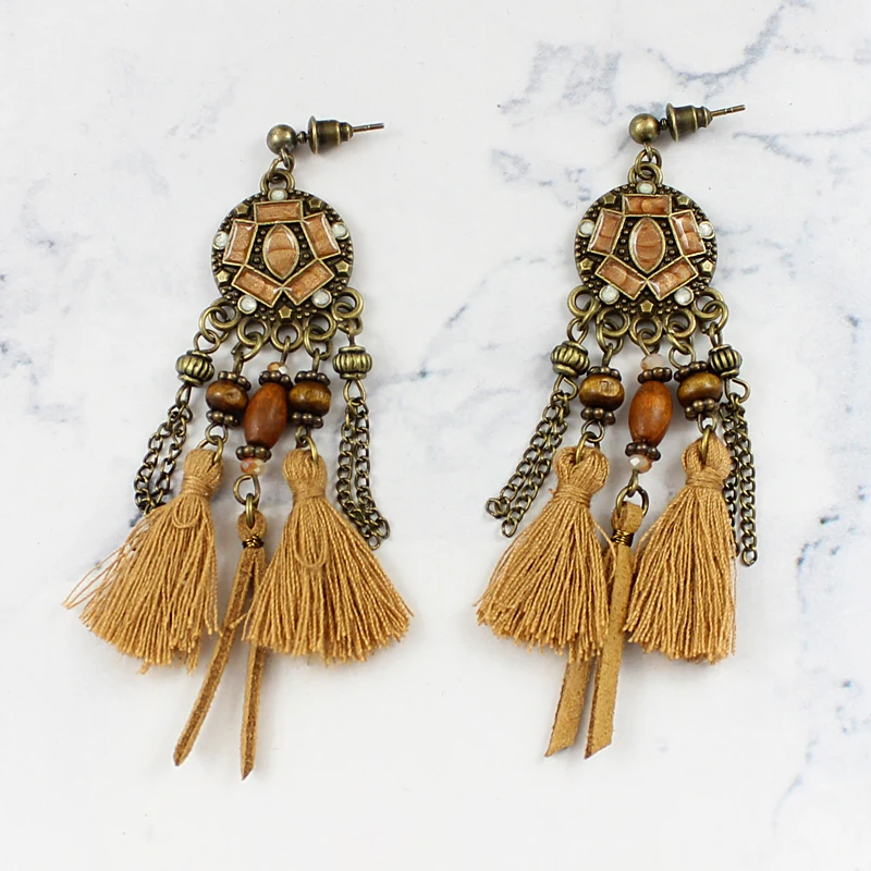 Dream catcher tassel Network chain connection Wooden beads Leather rope Pendant earrings Vintage ethnic style Bohemia earring
Dream catcher tassel Network chain connection Wooden beads Leather rope Pendant earrings Vintage ethnic style Bohemia earring