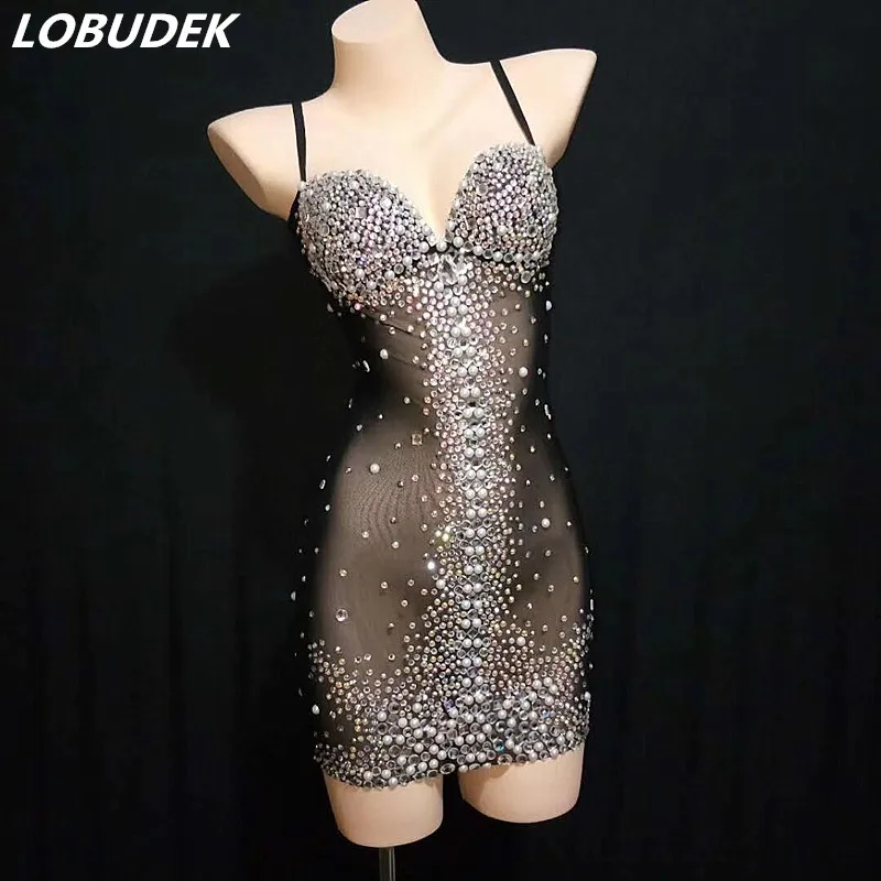 Sexy Nightclub Bar Transparent Stage Wear Black Mesh Shiny Rhinestone Beads Bodycon Short Dress Women Singer Performance Costume
Sexy Nightclub Bar Transparent Stage Wear Black Mesh Shiny Rhinestone Beads Bodycon Short Dress Women Singer Performance Costume