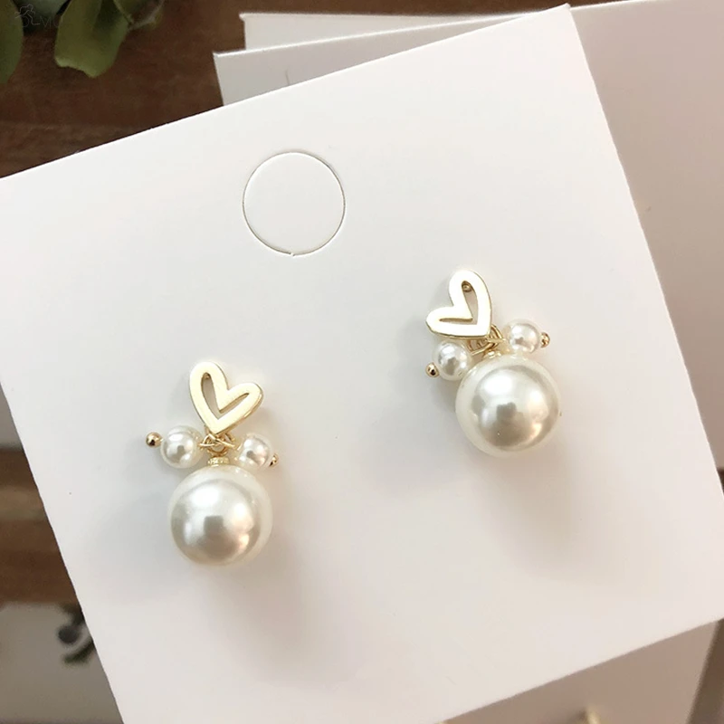 AOMU 2019 Korean New Metal Gold Love Heart Geometric Big and Small Size Pearl Stud Earrings for Women Girl Party Wedding Jewelry
AOMU 2019 Korean New Metal Gold Love Heart Geometric Big and Small Size Pearl Stud Earrings for Women Girl Party Wedding Jewelry