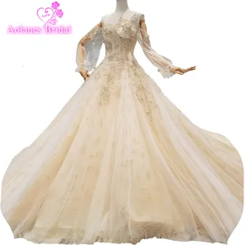 2018 New Gold Lace Scoop Cathedral Train Floor-length Bridal Gowns Ball Gown Lantern Sleeve Princess Backless Wedding Dresses
2018 New Gold Lace Scoop Cathedral Train Floor-length Bridal Gowns Ball Gown Lantern Sleeve Princess Backless Wedding Dresses