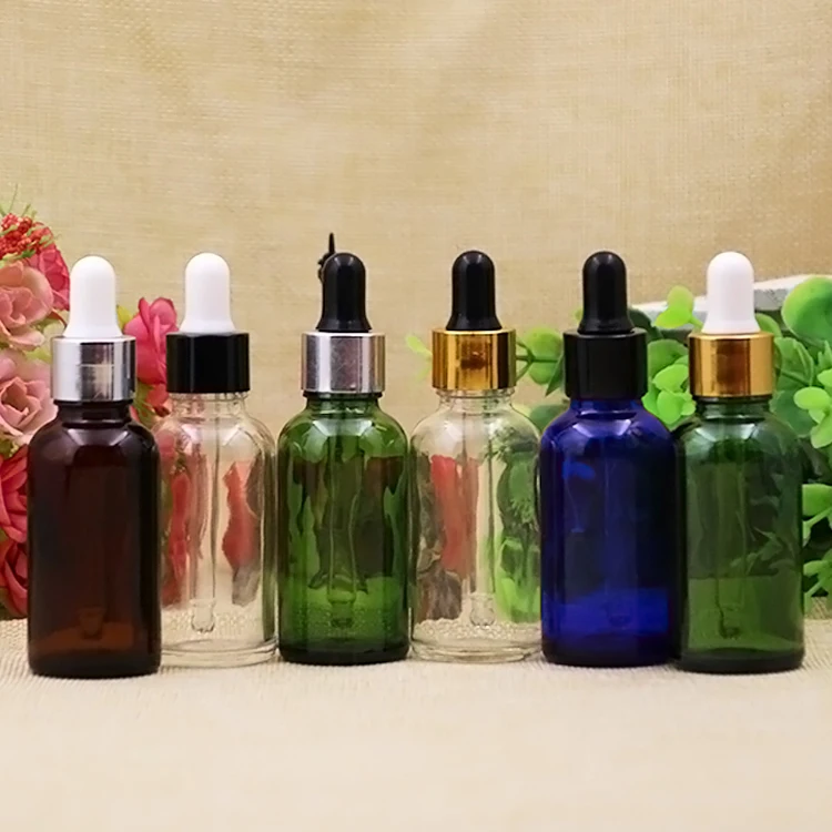 12/30PCS Empty 30ML Clear/Blue/Green/Brown Glass Essential Oil Dropper Bottle Essential Drop Vals Cosmetic Containers 
12/30PCS Empty 30ML Clear/Blue/Green/Brown Glass Essential Oil Dropper Bottle Essential Drop Vals Cosmetic Containers