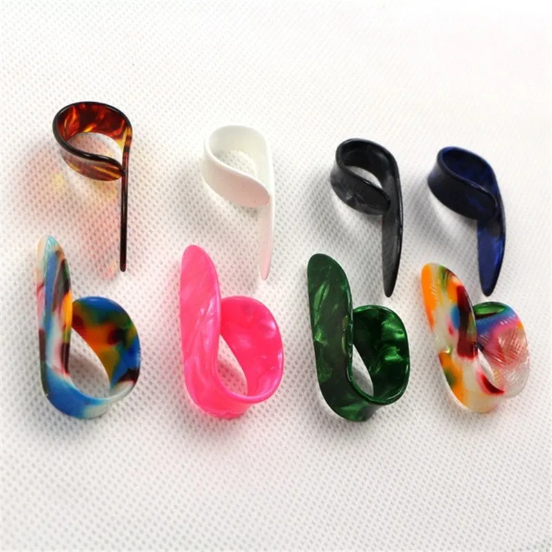 Guitar accessories celluloid thumb dial Thumb finger right hand finger Pick guitar thrum pull
Guitar accessories celluloid thumb dial Thumb finger right hand finger Pick guitar thrum pull