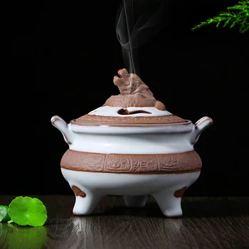 Back Xiangxiang furnace burner ceramic hollow lotus flowers inserted incense tea rhyme Ru tower incense tea set
Back Xiangxiang furnace burner ceramic hollow lotus flowers inserted incense tea rhyme Ru tower incense tea set