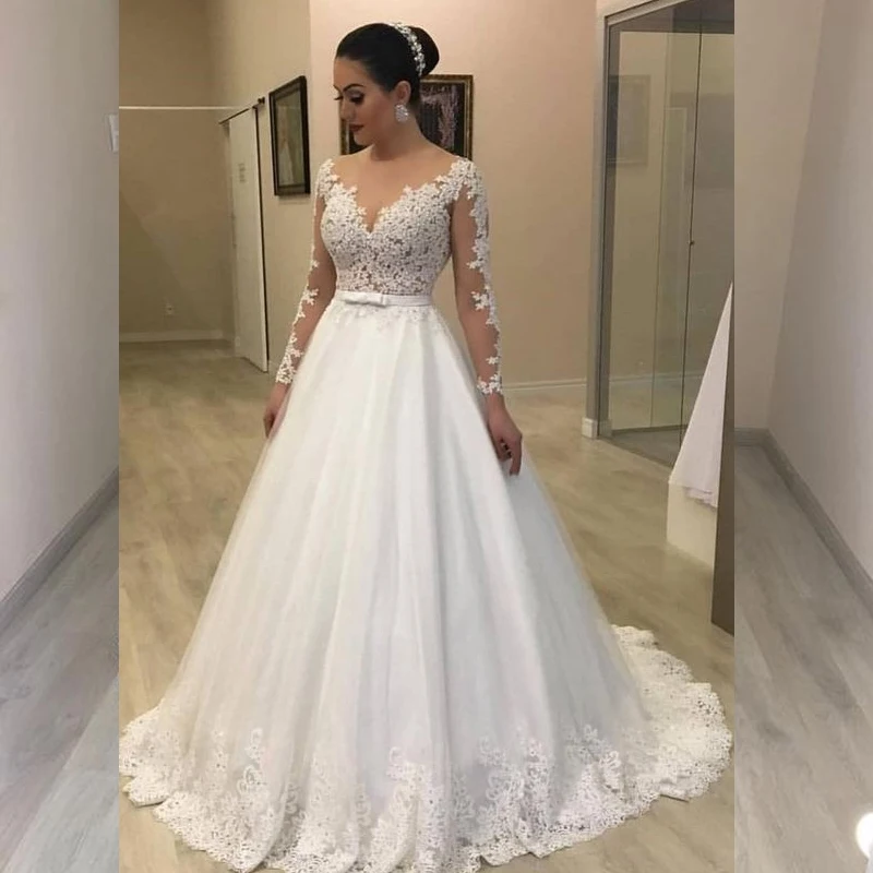 Vestido de noiva белое свадебное платье с длинным рукавом, бальное платье, Кружевная аппликация, иллюзия, круглый вырез, шлейф, свадебные платья
Vestido de noiva белое свадебное платье с длинным рукавом, бальное платье, Кружевная аппликация, иллюзия, круглый вырез, шлейф, свадебные платья