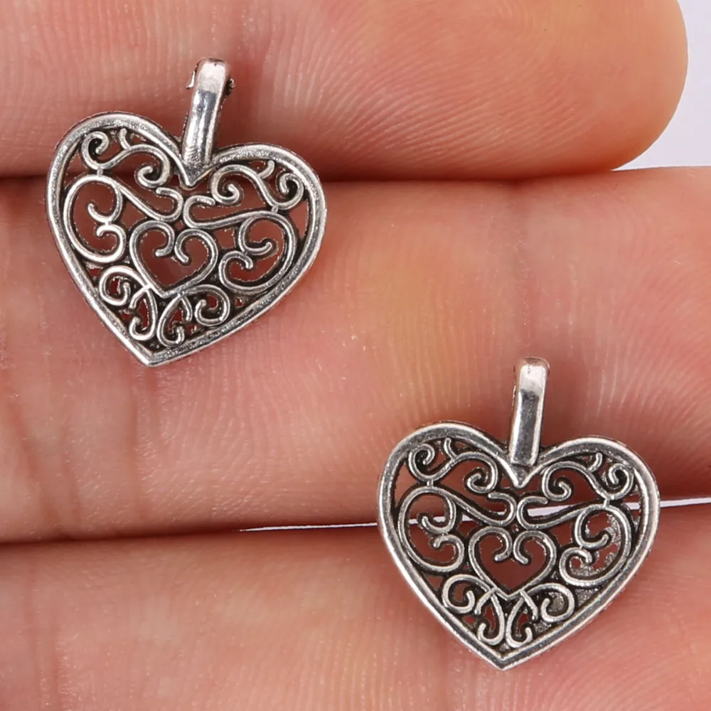 Vintage Fashion 21pcs 16x15mm Antique silver Alloy Heart Shape Hollow Pendant Charms
Vintage Fashion 21pcs 16x15mm Antique silver Alloy Heart Shape Hollow Pendant Charms