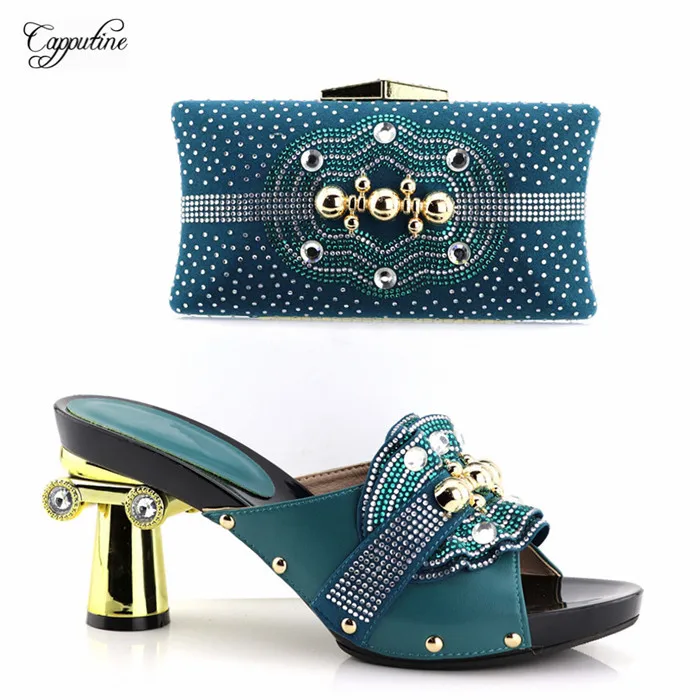 Latest Teal design African sandal shoes and handbag set fashion pumps and purse YH2018-01, heel height 9.5cm
Latest Teal design African sandal shoes and handbag set fashion pumps and purse YH2018-01, heel height 9.5cm