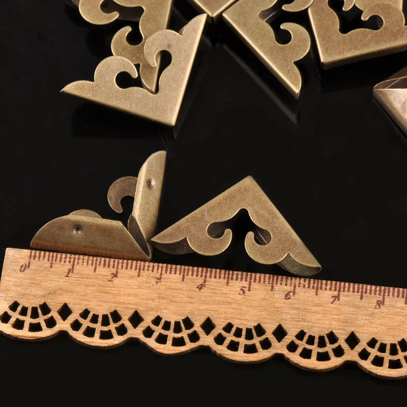 Description Picture 4 of item10Pcs Bronze Metal Book Corner DIY Photo Albums Menus Scrapbooking Accessories Pattern Corner Protectors Crafts 27x27x6mm C1731