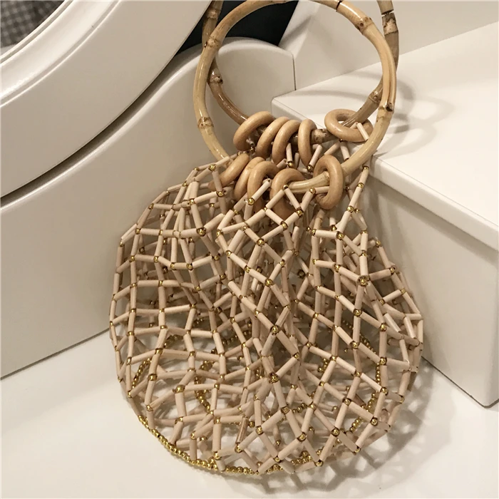 South Korea bamboo plaits, dream net, antique slub hollowed handbag, hand knitted fabric bamboo bag 
South Korea bamboo plaits, dream net, antique slub hollowed handbag, hand knitted fabric bamboo bag