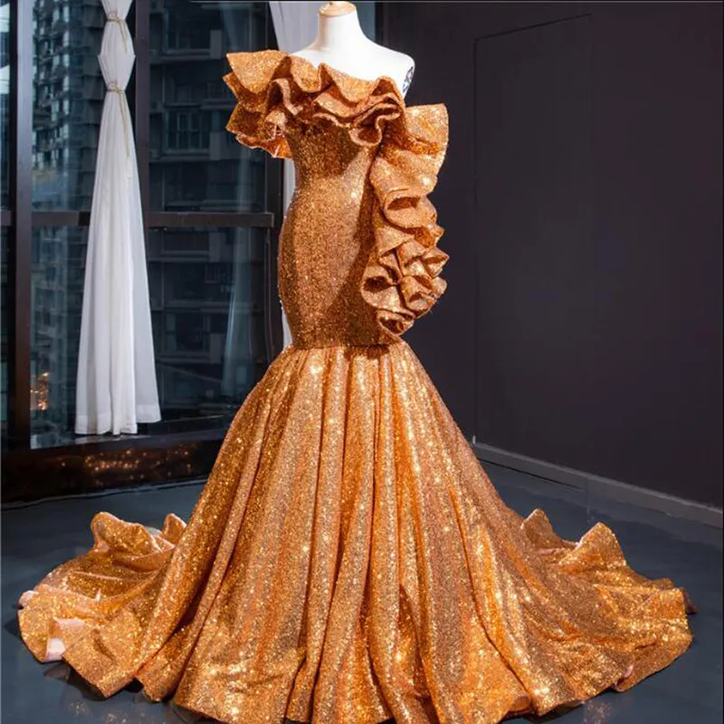 Gold One Shoulder Ruffle Evening Party Dresses Elegant Dubai Mermaid Sequin Sparkle Sexy Long Prom Gowns robe de soiree longue
Gold One Shoulder Ruffle Evening Party Dresses Elegant Dubai Mermaid Sequin Sparkle Sexy Long Prom Gowns robe de soiree longue