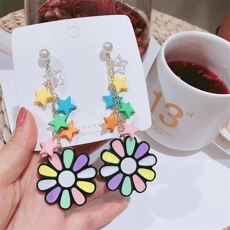 Korean Fashion Candy flower colored Earring stars Simulated Pearls Creative tassel for Women Jewelry Gift wholesale
Korean Fashion Candy flower colored Earring stars Simulated Pearls Creative tassel for Women Jewelry Gift wholesale
