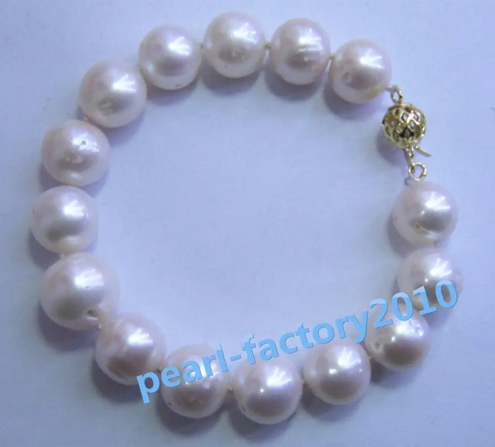 NATURAL 12-15MM ROUND SOUTH SEA GENUINE WHITE PEARL BRACELET 14K GOLD CLASP 42%
NATURAL 12-15MM ROUND SOUTH SEA GENUINE WHITE PEARL BRACELET 14K GOLD CLASP 42%