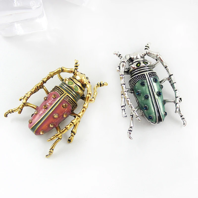 Green red rhinestone beetle brooch gold and silver tentacles Cartoon insect fashion badge Men's and women's denim leather pin
Green red rhinestone beetle brooch gold and silver tentacles Cartoon insect fashion badge Men's and women's denim leather pin