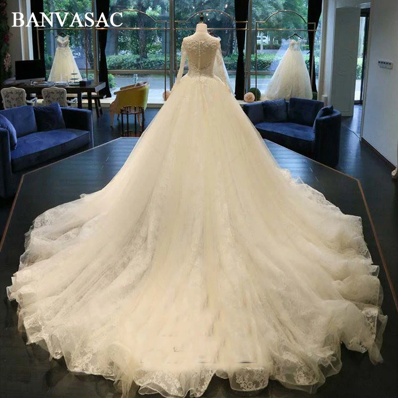 BANVASAC 2018 Real Photos Beadings Ball Gown Lace Appliques Wedding Dresses Long Sleeve Plus Size Chapel Train Bridal Gowns
BANVASAC 2018 Real Photos Beadings Ball Gown Lace Appliques Wedding Dresses Long Sleeve Plus Size Chapel Train Bridal Gowns