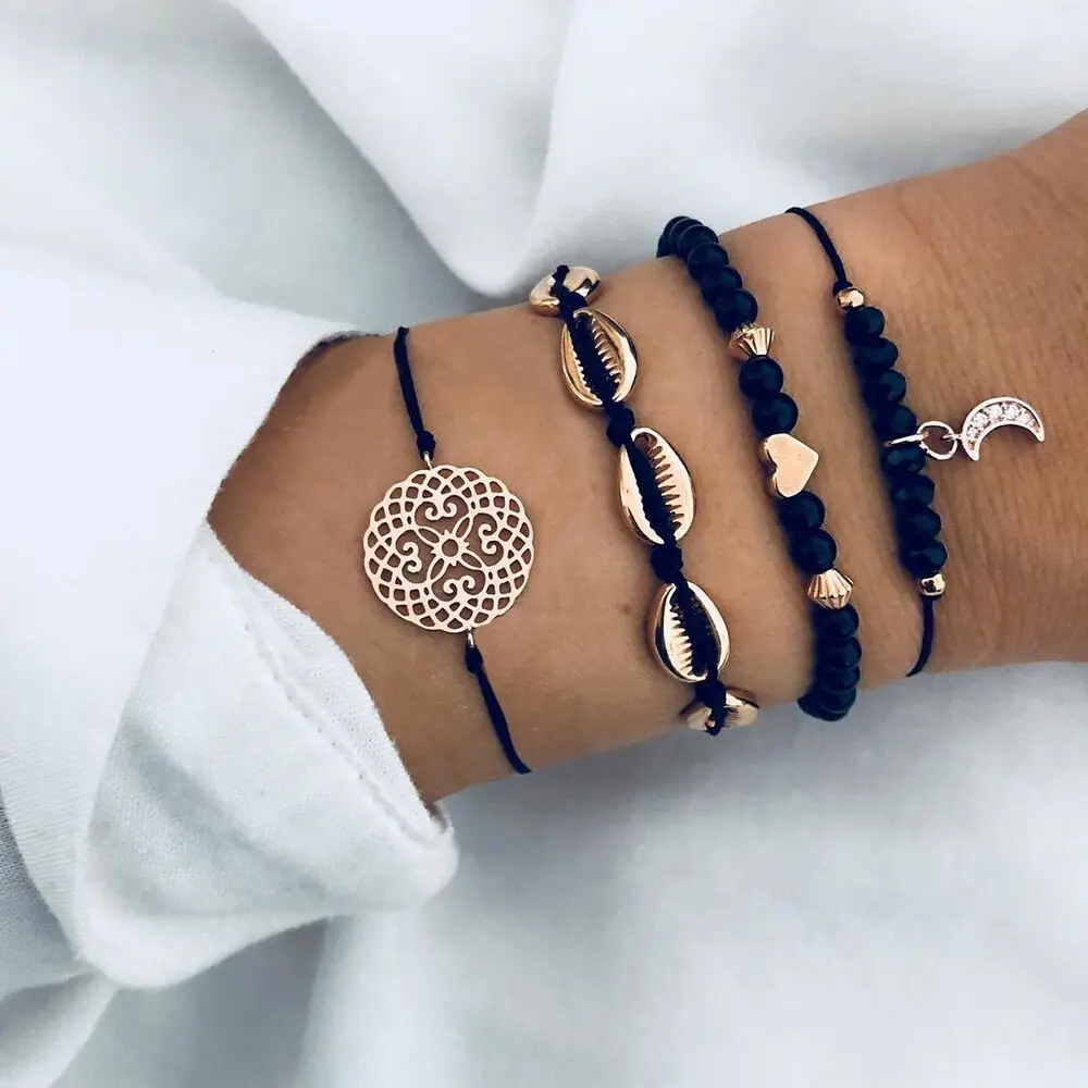 4 Pcs/Set Bohemia Round Carving Pendant Moon Heart Shell Bracelets Black Rope Chain Gold Pendant Bracelets Set For Women Jewelry
4 Pcs/Set Bohemia Round Carving Pendant Moon Heart Shell Bracelets Black Rope Chain Gold Pendant Bracelets Set For Women Jewelry